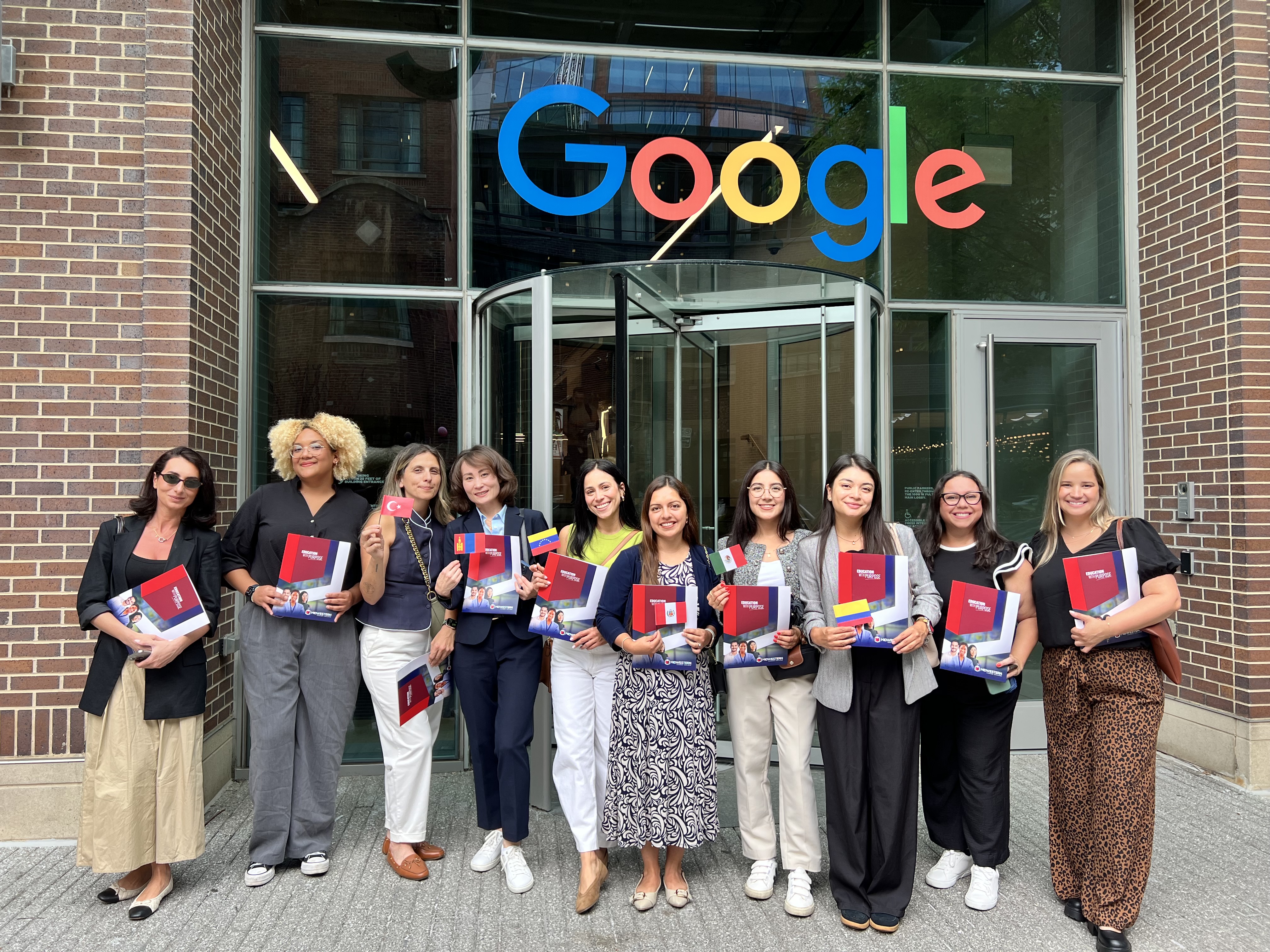 Group of Midwestern Career College international students at the entrance to Google Chicago.