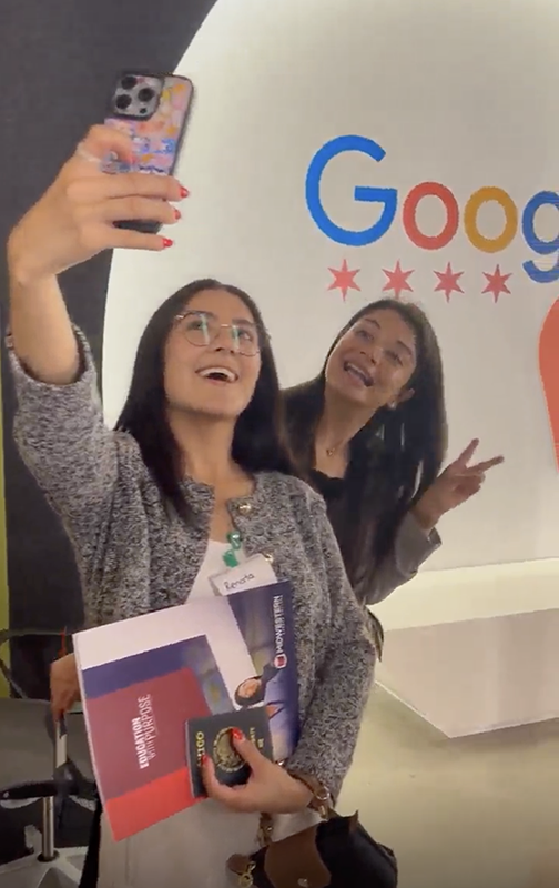 MCC international students taking photos during their visit to Google Chicago.