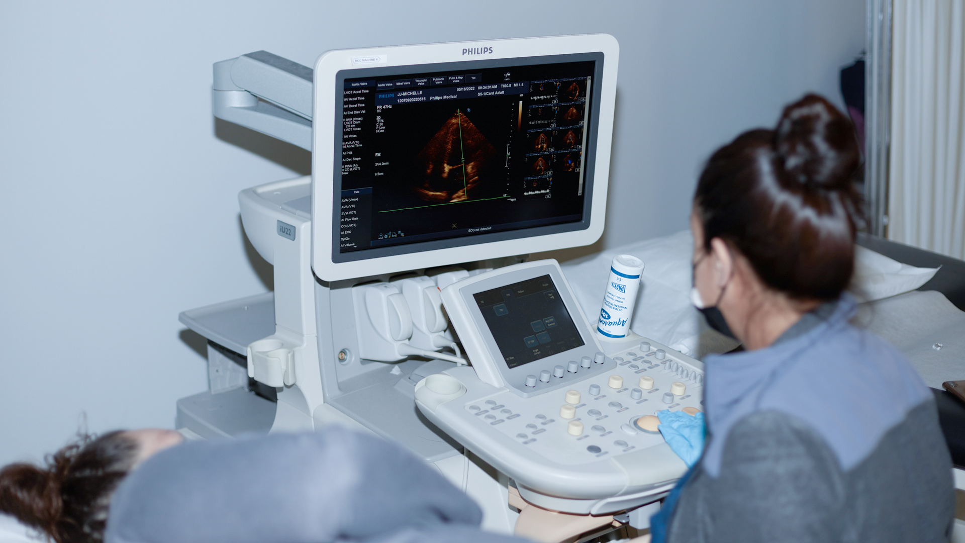 Midwestern Career College NICVS student using cardiac ultrasound equipment to assess left ventricular function during hands-on cardiovascular sonography training