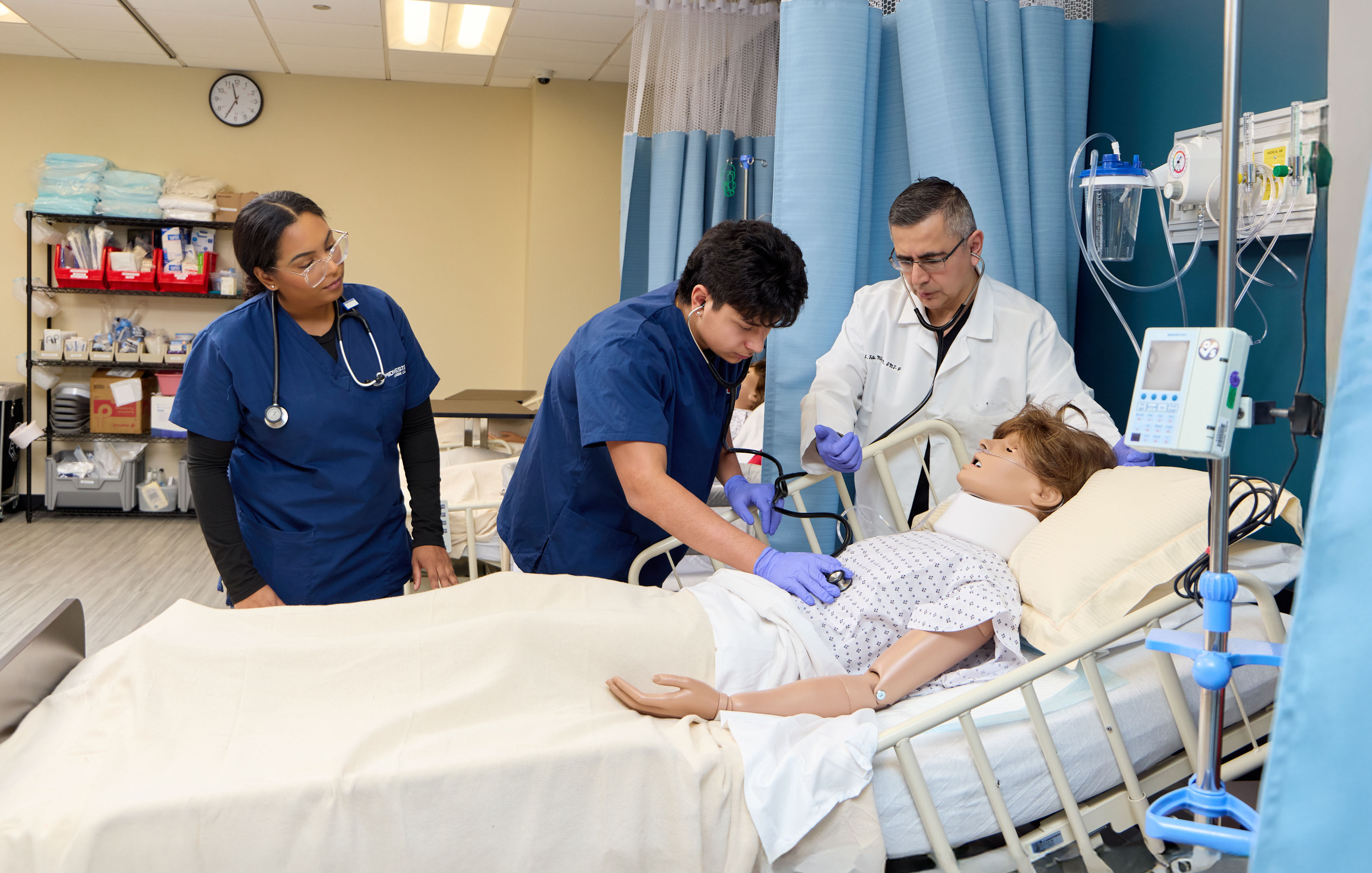 Midwestern Career College Licensed Practical Nursing (LPN) students practicing patient assessment skills in the Chicago campus simulation lab.