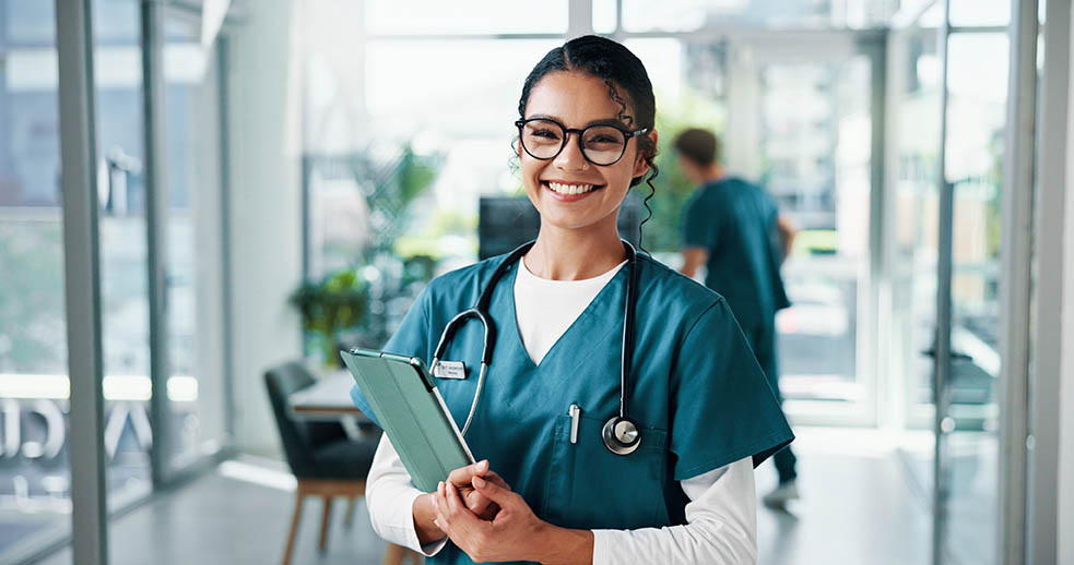 Student in nursing scrubs in a healthcare education setting, representing practical nursing training in Chicago